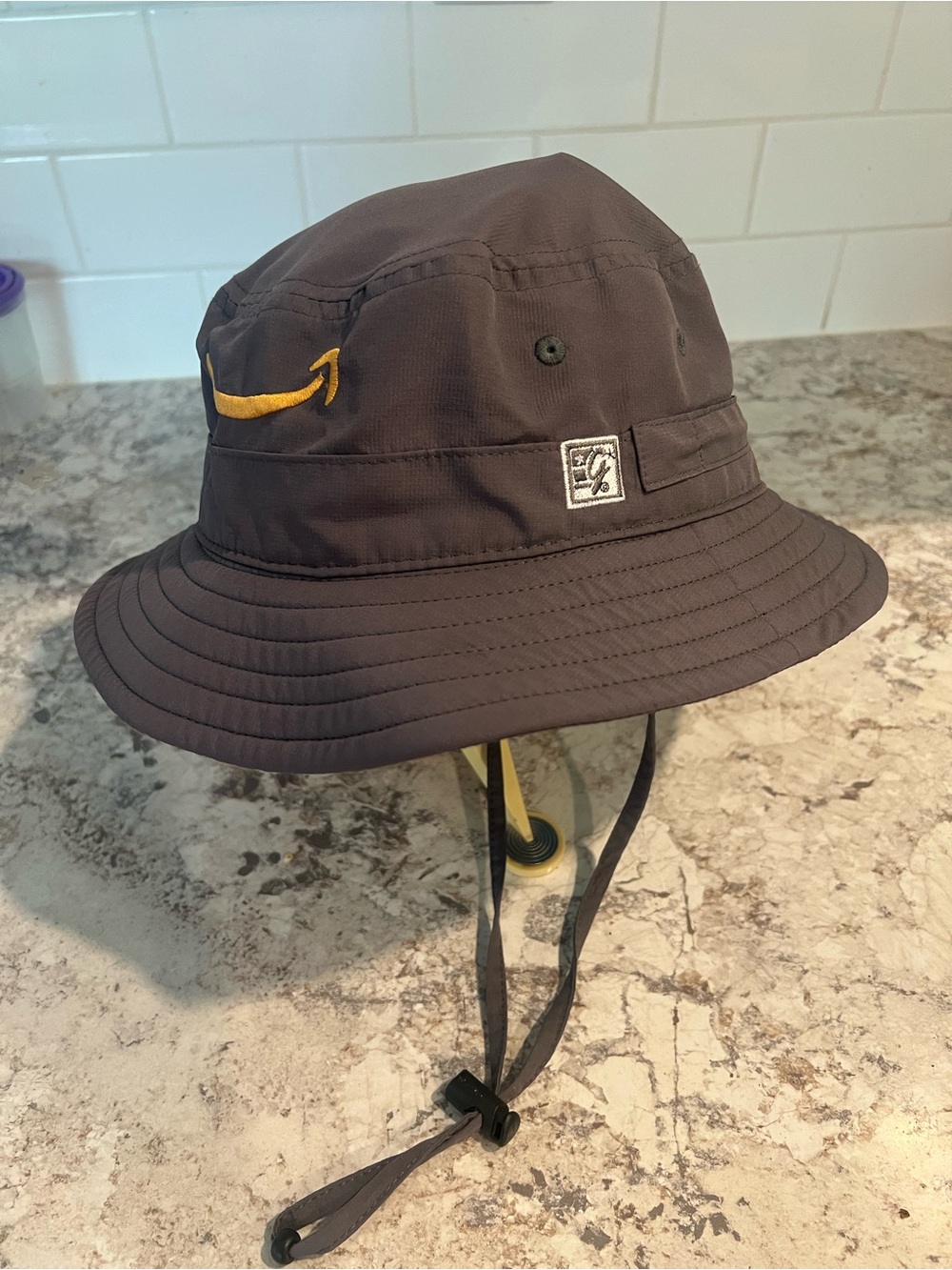 The Game Grey Bucket Hat  with Yellow Swoosh One Size Adult with Drawstring